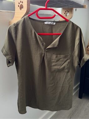 Khaki green short sleeve blouse with pocket detail